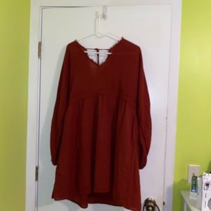 Never been worn . Rust babydoll dres